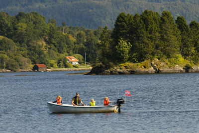 A small boat on the fjord
